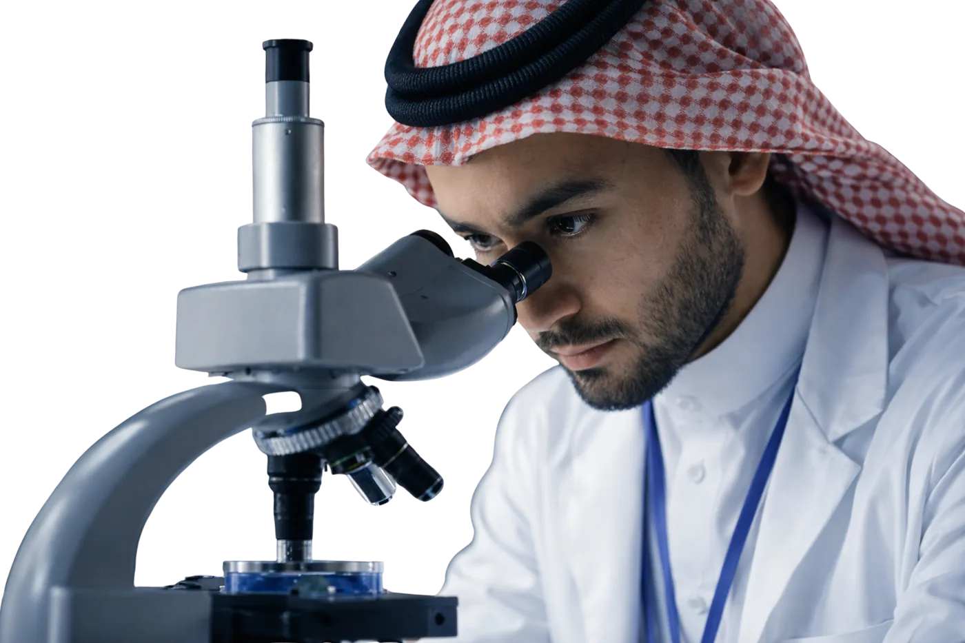 Scientist examining a sample under a microscope